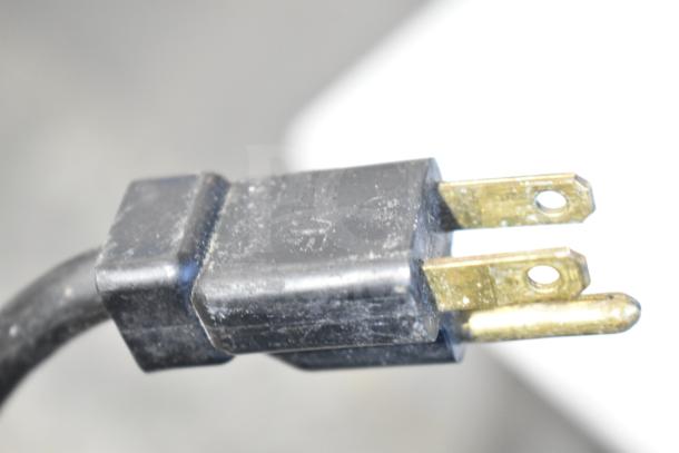 Close-up of a power plug for a Berg EDMT-72-30 Commercial Sandwich Salad Prep Table, 115 Volts, 1 Phase.