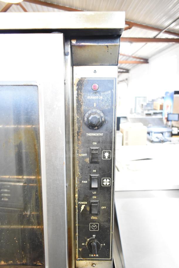 2 Royal RCOS-1 commercial convection ovens, natural gas, view and solid doors, thermostatic controls, worn condition.