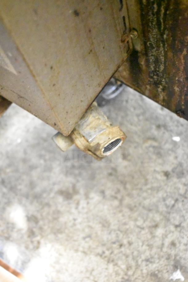 Rusty gas valve on Royal RCOS-1 commercial convection oven, highlighting potential wear and maintenance needs.