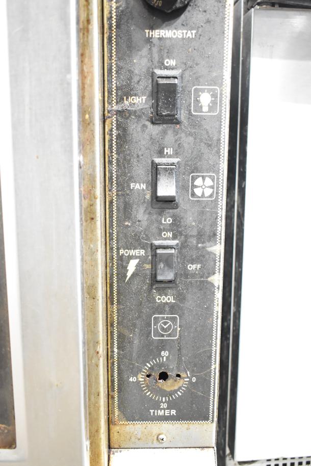 Royal RCOS-1 convection oven control panel, features thermostat, power, fan, and timer settings. Signs of wear visible.