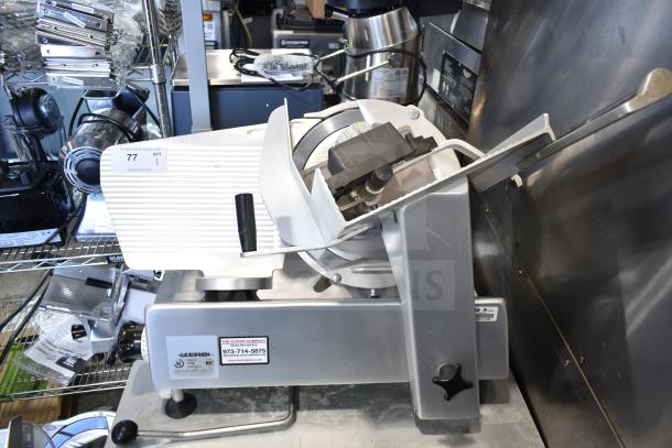 Bizerba commercial countertop meat slicer, 120 volts, 1 phase, stainless steel, good condition, visible manufacturer tag.