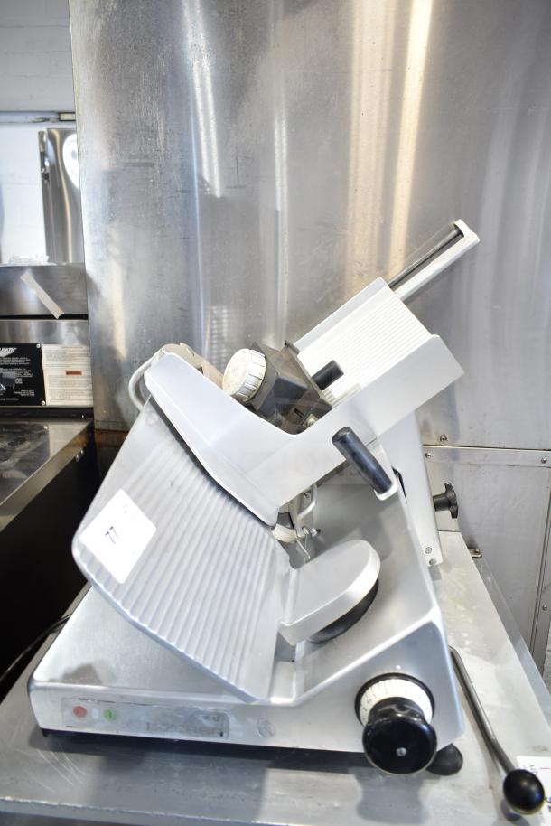 Bizerba Commercial Meat Slicer, countertop model, 120 volts, 1 phase, used condition, features adjustable thickness dial.