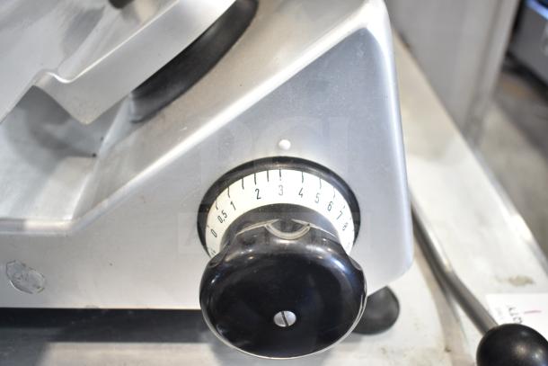 Bizerba Commercial Countertop Meat Slicer, features adjustable thickness dial, metallic finish, operates on 120 volts, 1 phase.