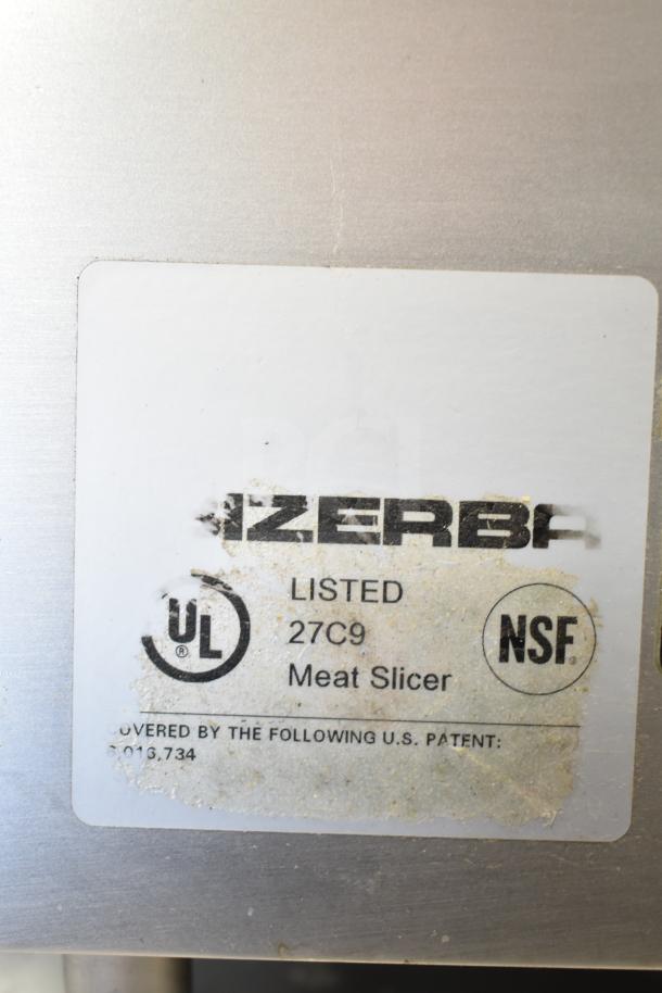 Bizerba commercial countertop meat slicer, 120 volts, 1 phase. UL and NSF certified. Serial: 27C9. Patent: 6,016,734.