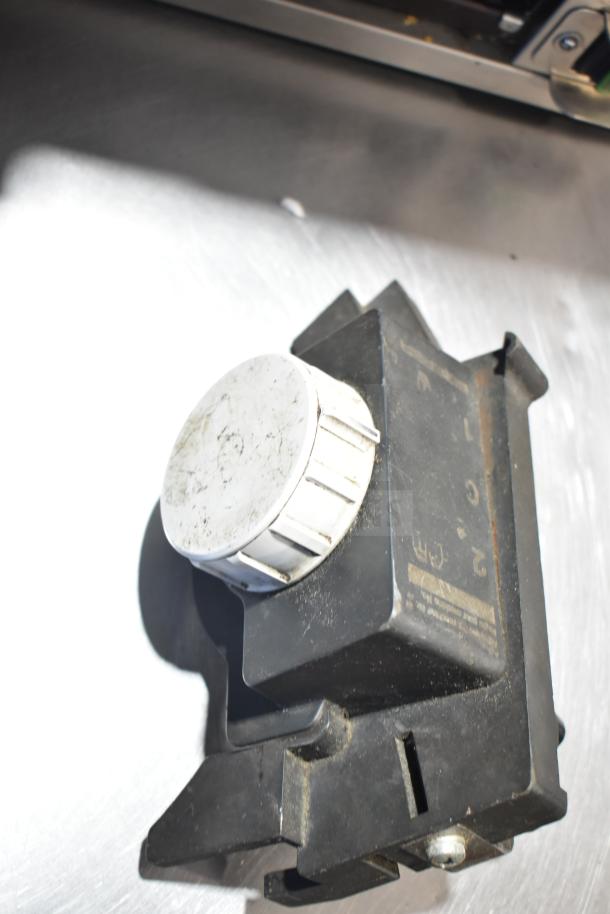 Bizerba Commercial Countertop Meat Slicer, 120 Volts, 1 Phase. Features adjustable settings. Used condition with visible markings.