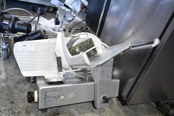 Bizerba SE 12 D commercial meat slicer, silver, 120V, 1 phase, minimal wear, control knob, tag number 78 visible.