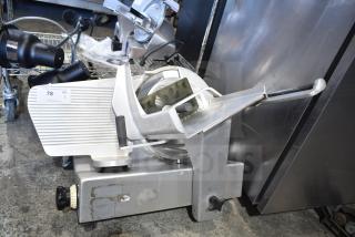 Bizerba SE 12 D commercial meat slicer, silver, 120V, 1 phase, minimal wear, control knob, tag number 78 visible.