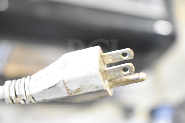 Bizerba SE 12 D commercial meat slicer plug, 120V, 1 phase, showing wear. Power cord for countertop slicer model.