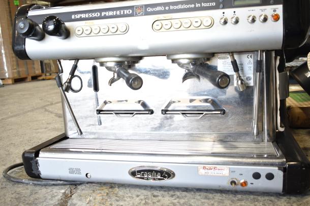 Brasilia OPUS-R-D-2 espresso machine, 2 group, 2 portafilters, 2 steam wands, 220V, commercial use, visible wear.