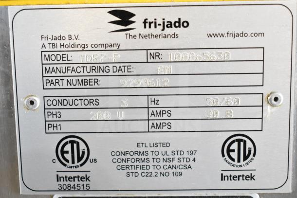 Fri-jado TDR7-P rotisserie oven label, 208V, 3 phase, ETL listed. Includes model, manufacturing date, part number details.
