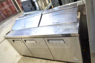 Atosa MSF8304 commercial sandwich salad prep table with mega top, stainless steel, on casters, 115 Volts, 1 Phase.