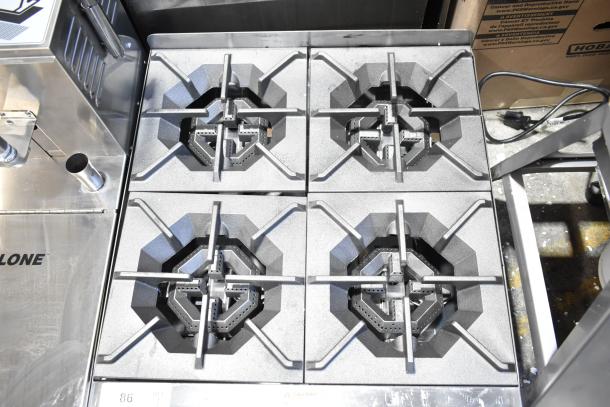 Brand new 2025 Cooking Performance Group 4-burner natural gas range, model 351RCPG24NL, 88,000 BTU, countertop design.