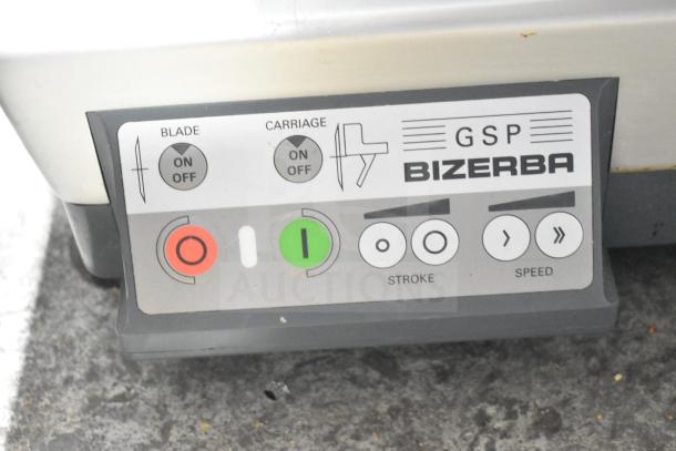 "2020 Bizerba GSP HD meat slicer control panel. Features blade, carriage on/off buttons, stroke, and speed settings."