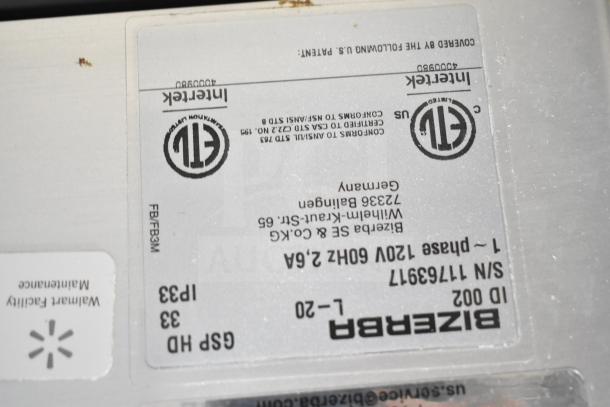 2020 Bizerba GSP HD meat slicer label, showing model, 120V, 1 phase, certification marks, and manufacturer details.