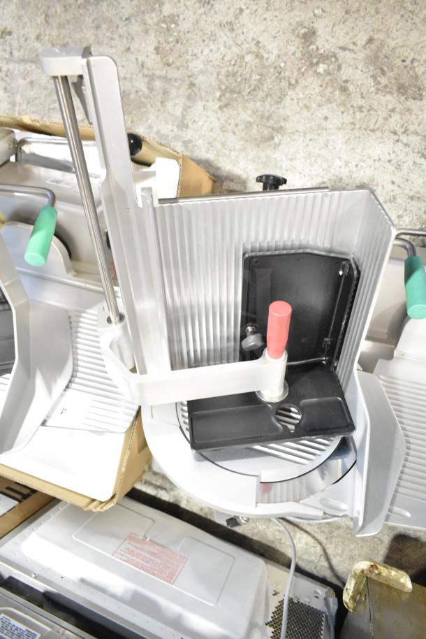 2020 Bizerba GSP HD commercial meat slicer, 120 volts, 1 phase. Features adjustable blade guard, excellent condition.