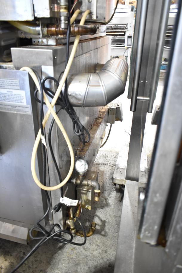 Two Hardt Inferno 4500 rotisserie ovens on casters, natural gas powered, 40-bird capacity each, 95,000-101,000 BTU.