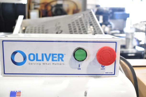 Oliver 797-32NC bread loaf slicer, features Pro Guard Artisan Bread Safety Chute, labeled controls visible, 115 volts.
