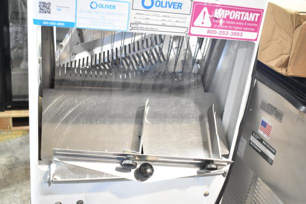 Oliver 797-32NC bread loaf slicer with Pro Guard chute, 115V, 1 phase. Features safety labels and model info.