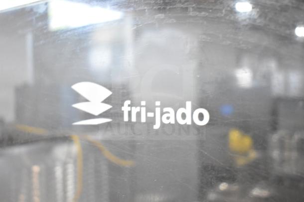 Fri-jado TDR7-P rotisserie oven with commercial casters, 208V, 3 phase. Features Fri-jado logo on the front panel.