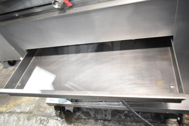 Fri-jado TDR7-P commercial electric rotisserie oven on casters, 208 volts, 3 phase, stainless steel body, visible drawer.