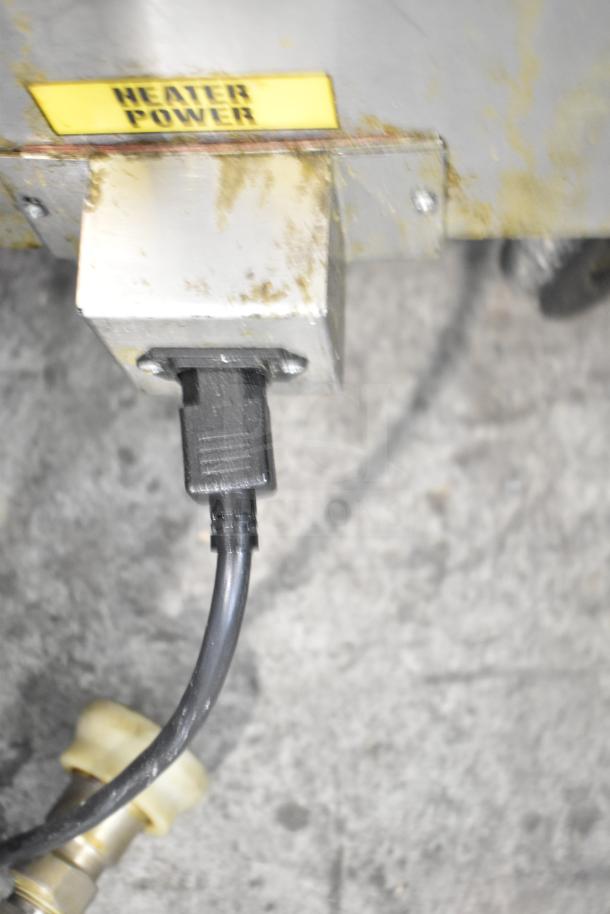 2021 Frontline 47SS Grease Caddy, commercial casters, plug connection. Heater power label visible, used condition.