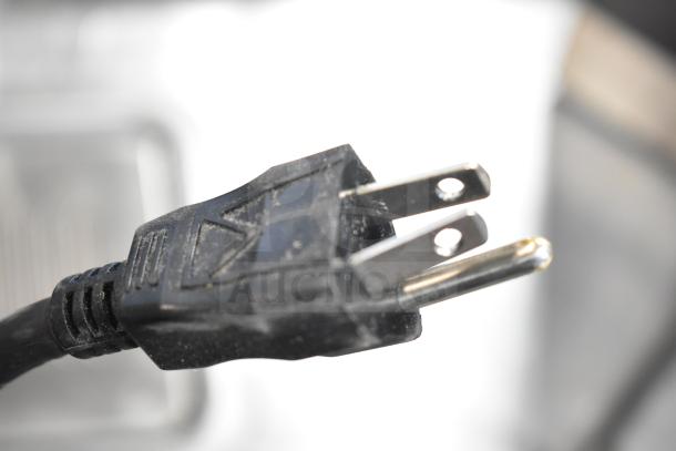 Close-up of a plug for the Bunn VPR Commercial Coffee Machine, indicating a 120-volt, 1-phase connection.