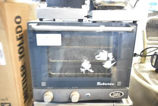 Cadco XAF003 Roberta commercial convection oven, metal, electric, 120V, 1 phase, visible wear on glass door.
