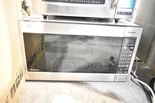2021 Panasonic NN-T945SFX countertop microwave oven, stainless steel, with control panel, 120 volts, includes plate.