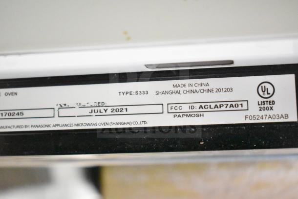2021 Panasonic NN-T945SFX countertop microwave oven label. Manufactured in July 2021, made in China. Model: S333.