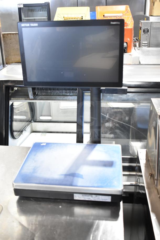 Mettler Toledo FreshWay food portioning scale, large display, 100-240 volts, 1 phase, good condition, model identifier visible.