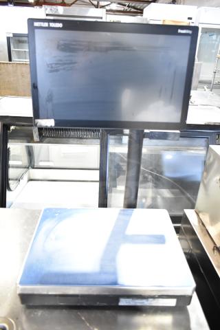 Mettler Toledo FreshWay food portioning scale, sleek design, digital display, 100-240 volts, 1 phase, in good condition.