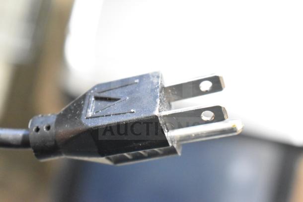 Close-up of the plug for a 2017 Hobart HTi-7LH26 commercial food portioning scale, 120/208-240V, tested working.