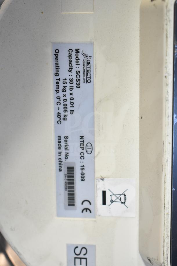 Detecto SCS30 Produce Scale label showing model, 30 lb capacity, CE mark, NTEP certification, made in China.