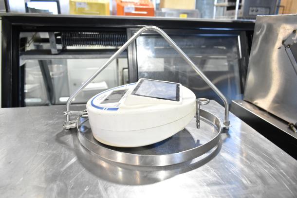 Detecto SCS30 produce scale, white plastic casing, metal hanger, digital display, good condition, accurate weight measurement.