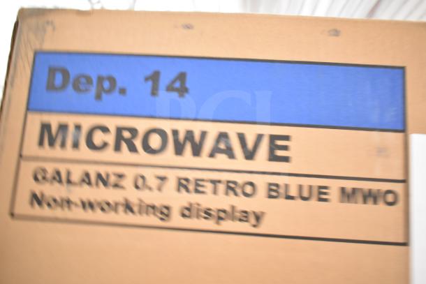 Box for BRAND NEW SCRATCH AND DENT Galanz 0.7 Cu ft Retro Countertop Microwave Oven. Features non-working display.