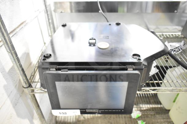 2025 Hobart HTi-7LH4W commercial food portioning scale, touchscreen display, tested, no power cord, good condition.