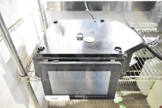 2025 Hobart HTi-7LH4W commercial food portioning scale, touchscreen display, tested, no power cord, good condition.