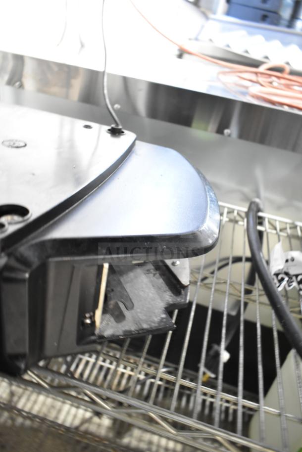 2025 Hobart HTi-7LH4W commercial portioning scale, black-silver, tested working, missing power cord. Model details visible.