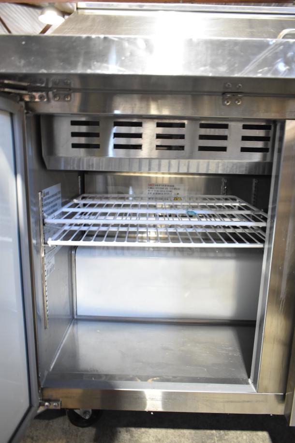 Coldline SMP-48 commercial sandwich salad prep table, stainless steel, bain marie mega top, 115 volts, 1 phase, interior view.