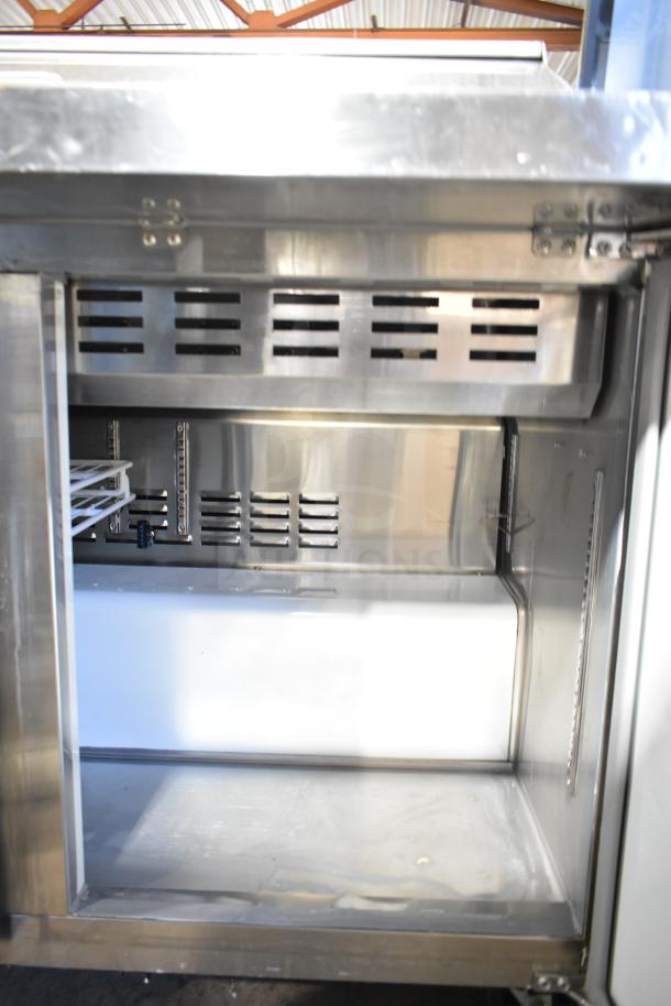Coldline SMP-48 Commercial Sandwich Salad Prep Table, stainless steel interior, model SMP-48, 115V, good condition.