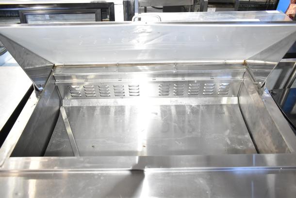 Coldline SMP-48 commercial sandwich salad prep table, mega top, stainless steel interior, open lid, clean, used condition.