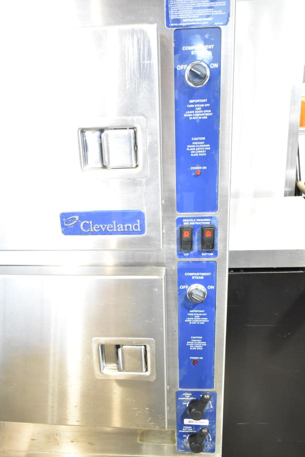 Cleveland 24CGA6.2S commercial steam cabinet, natural gas, 2 decks, 50,000 BTU, stainless steel, visible brand and controls.