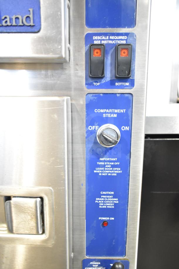 Cleveland 24CGA6.2S commercial steam cabinet controls, featuring power switches and instructions, stainless steel finish.