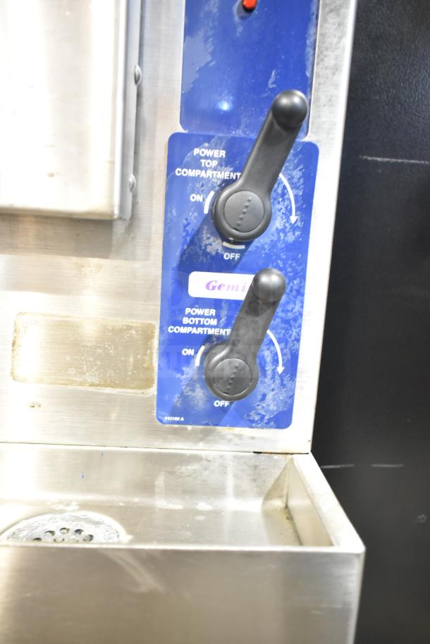 Cleveland 24CGA6.2S commercial steam cabinet control panel with power toggles for top and bottom compartments; slightly worn.