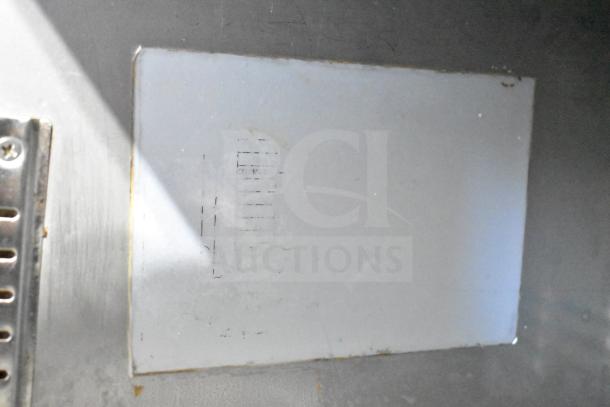 Universal Commercial 2-Door Undercounter Cooler, 115 Volts, 1 Phase. Silver finish, sturdy construction for commercial use.