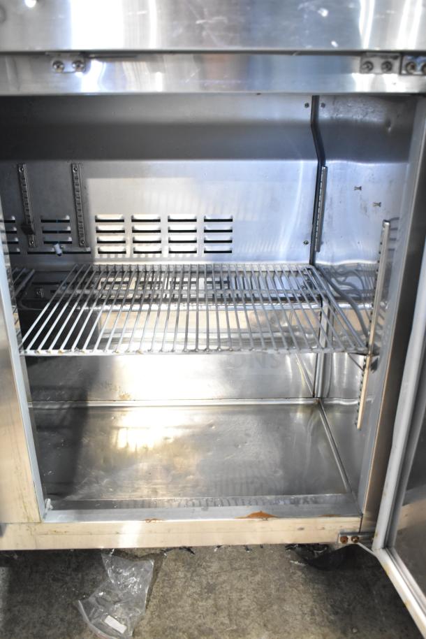 Universal Commercial 2 Door Undercounter Cooler, stainless steel, 115 volts, 1 phase, with adjustable shelves.