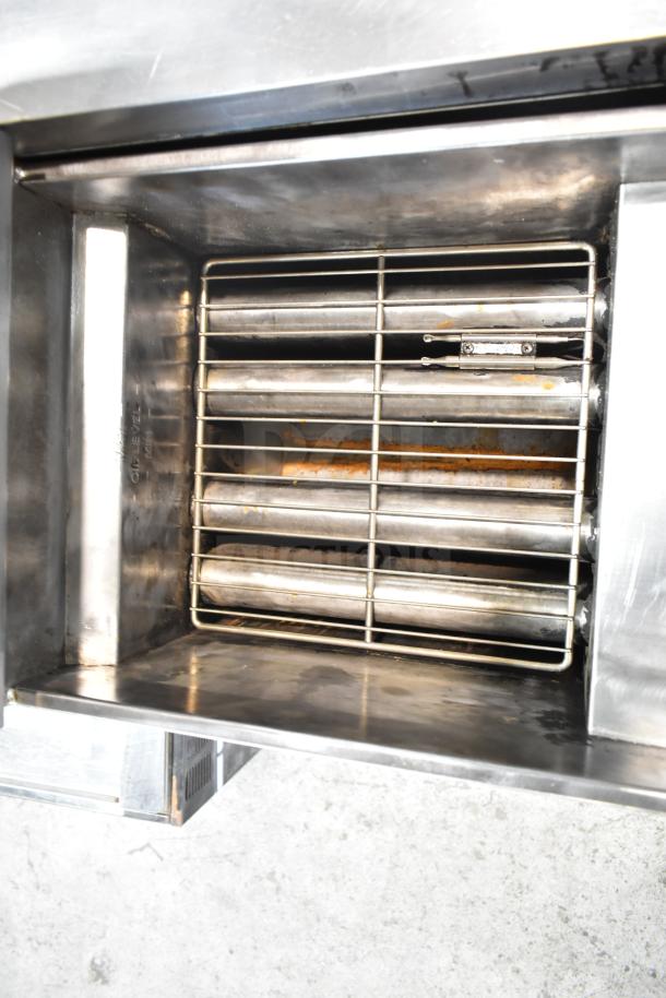 Pitco Frialator 40C natural gas fryer, 122,000 BTU, stainless steel interior, floor model, commercial use, good condition.