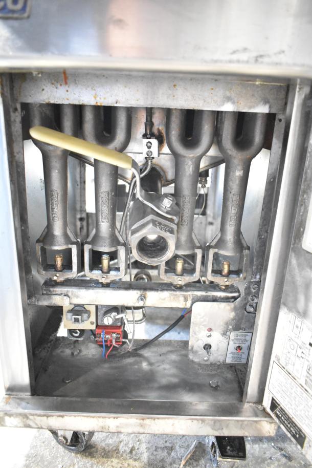Pitco Frialator 40C commercial natural gas fryer, 122,000 BTU, interior view showing burners and components, used condition.