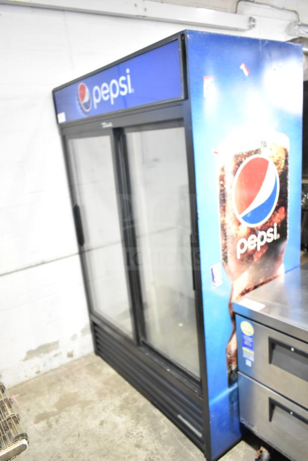 True GDM-45-LD commercial 2-door cooler merchandiser with Pepsi branding, good condition, 115 volts, 1 phase.