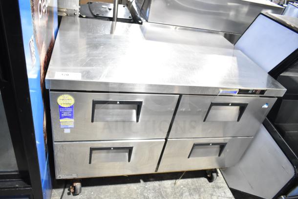 Everest Commercial 4 Drawer Cooler, stainless steel, 115 volts, 1 phase, warranty sticker, on wheels, good condition.